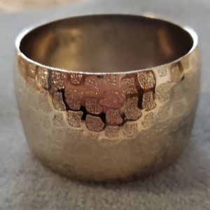 Express goldtone wide bangle.